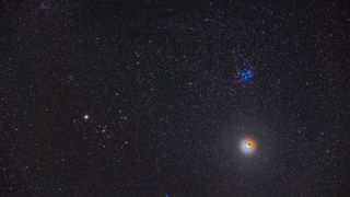 night sky scene showing the Pleiades star cluster as blue stars above the moon.
