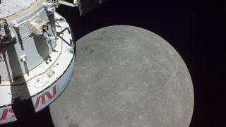 A portion of the far side of the Moon looms large just beyond the Orion spacecraft in this image taken on the sixth day of the Artemis I mission by a camera on the tip of one of Orion’s solar arrays.